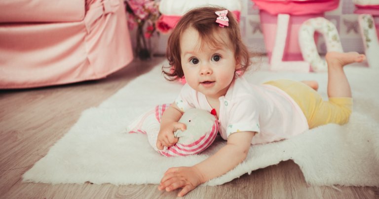 Brown-haired baby smiling - Gillespie Approach–Craniosacral Fascial Therapy