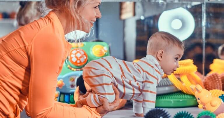 Message for Gillespie Approach providers - happy mom playing with baby - Gillespie Approach–Craniosacral Fascial Therapy