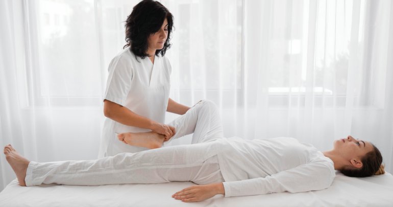Key to Gillespie Approach–Craniosacral Fascial Therapy - woman providing treatment to another woman