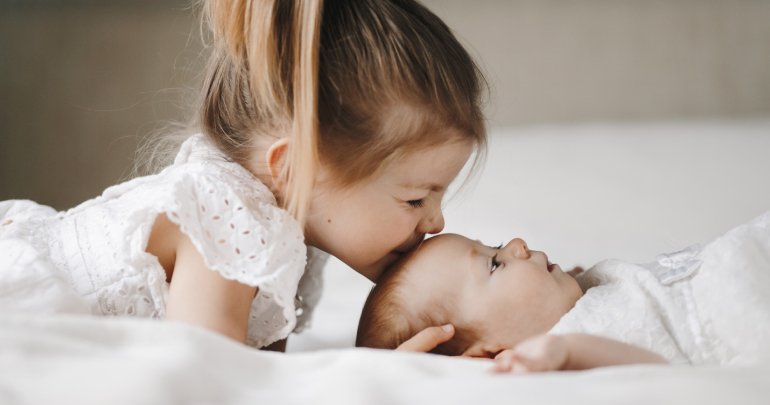 Chiari malformation - sister kissing baby - Gillespie Approach–Craniosacral Fascial Therapy
