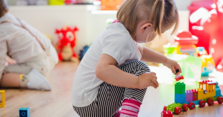 Genetic cause or birth trauma - girl playing with toy train - Gillespie Approach–Craniosacral Fascial Therapy