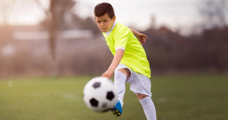Power of the Gillespie Approach - boy playing soccer - Craniosacral Fascial Therapy