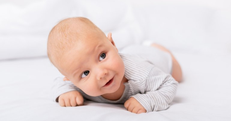 Many red flags - baby on bed - Gillespie Approach– Craniosacral Fascial Therapy