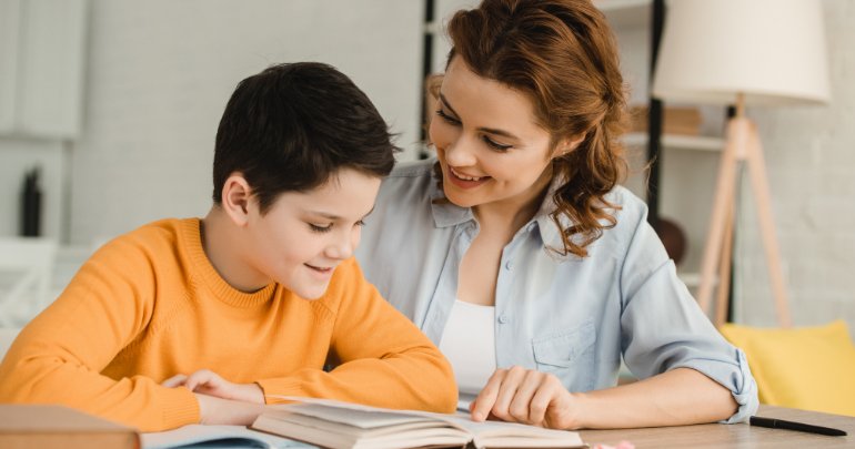 Dyslexia - mother showing boy to read - Gillespie Approach–Craniosacral Fascial Therapy