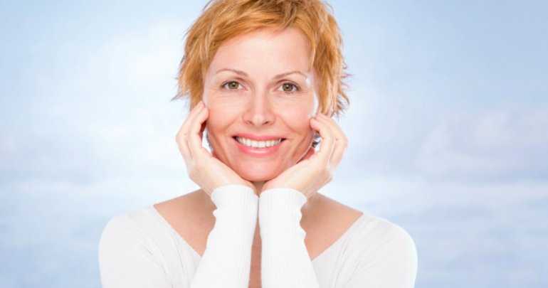 Lurking deep in the traumatic onion - middle-age woman smiling - Gillespie Approach–Craniosacral Fascial Therapy