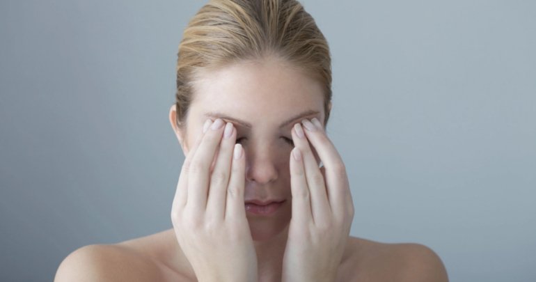 Eye strain - woman rubbing eyes - Gillespie Approach–Craniosacral Fascial Therapy