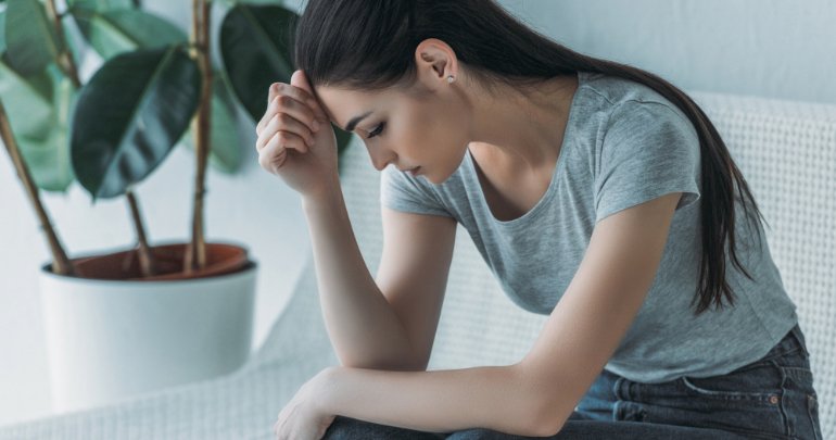 Depression and leg pain - woman looking somber - Gillespie Approach–Craniosacral Fascial Therapy