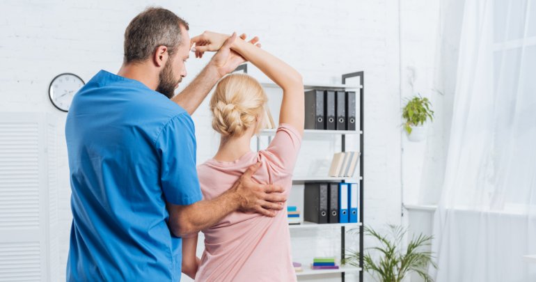 Checkup visit - practitioner working with patient - Gillespie Approach–Craniosacral Fascial Therapy