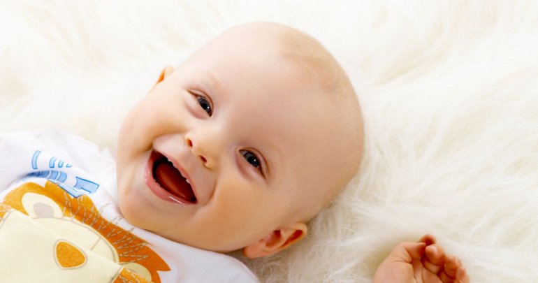Infant choking, swallowing difficulty and gagging - baby smiling - Gillespie Approach–Craniosacral Fascial Therapy